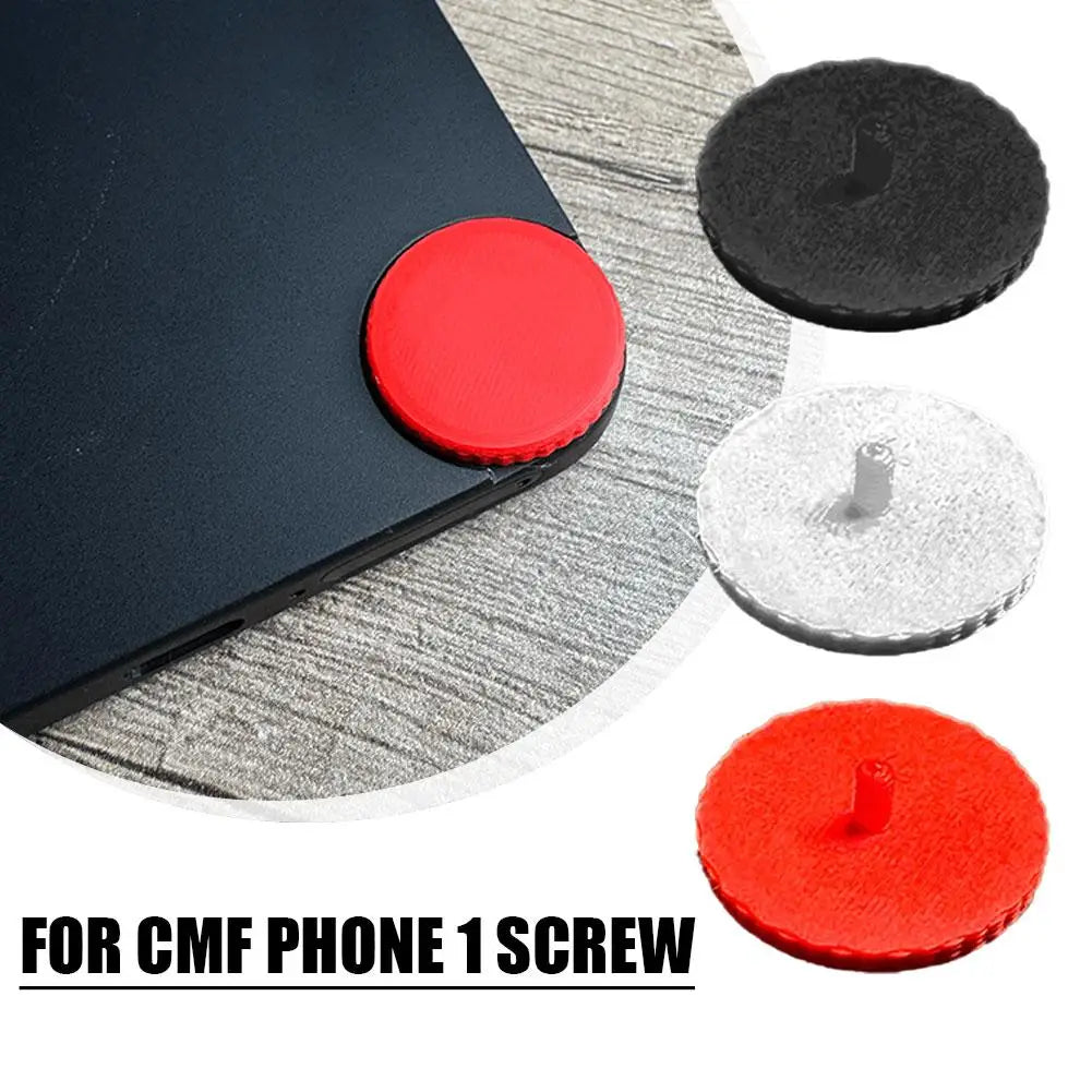 Capuchon de vis de remplacement pour téléphone CMF 1, circulaire, rouge, avec saillie centrale, présenté aux côtés des variantes noire et argentée pour un usage d’accent personnalisé
