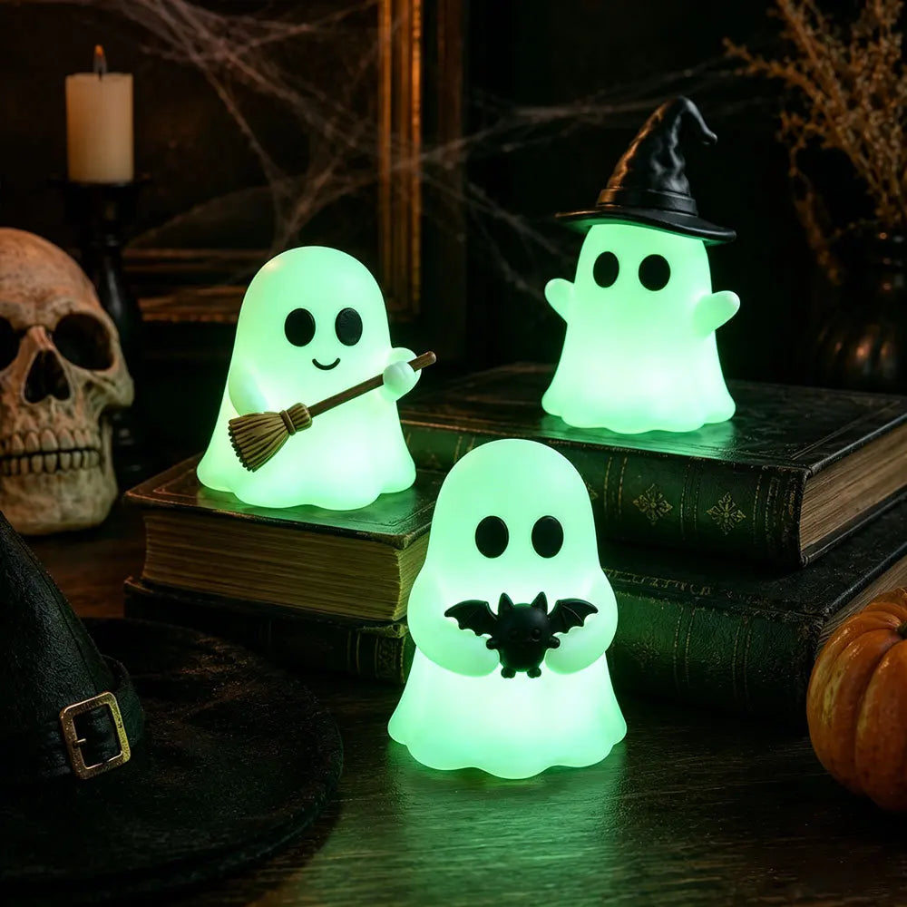Halloween-themed desktop decoration scene - cute little ghosts, decorative items, mini glowing micro-landscape