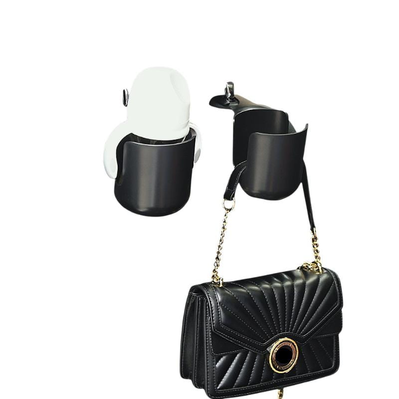 Bolsa tipo bolso de cuero acolchado negro con correa de cadena de tono dorado y cierre circular, presentada junto con la bandeja organizadora para consola central Icar V23.