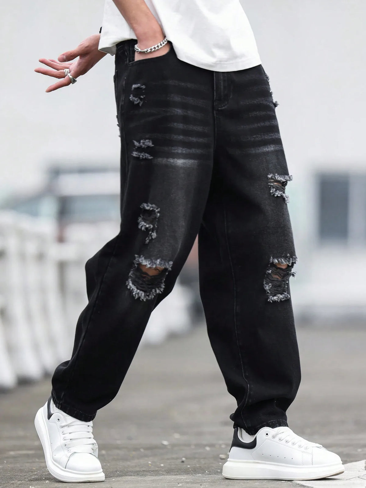Men's Black Ripped Denim Harem Pants for Spring and Summer, Stylish and Minimalist, a Game - Changer for Lazy Outfits