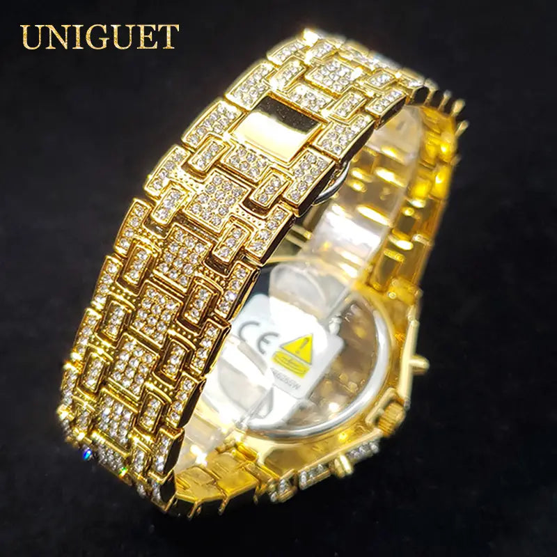 Gold-tone iced diamond men’s quartz watch with a dazzling pave-set diamond-encrusted silver bracelet and bezel luxury hip hop timepiece.