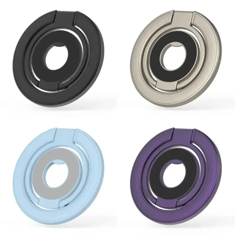 La imagen muestra cuatro anillos portateléfonos magnéticos de doble cara para soporte de teléfono Magsafe, en color negro, plateado, azul claro y morado.