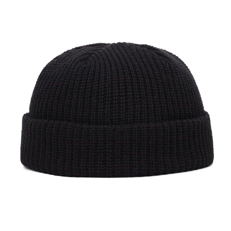 Black ribbed knit winter beanie hat with a folded brim designed as a unisex warm cap.