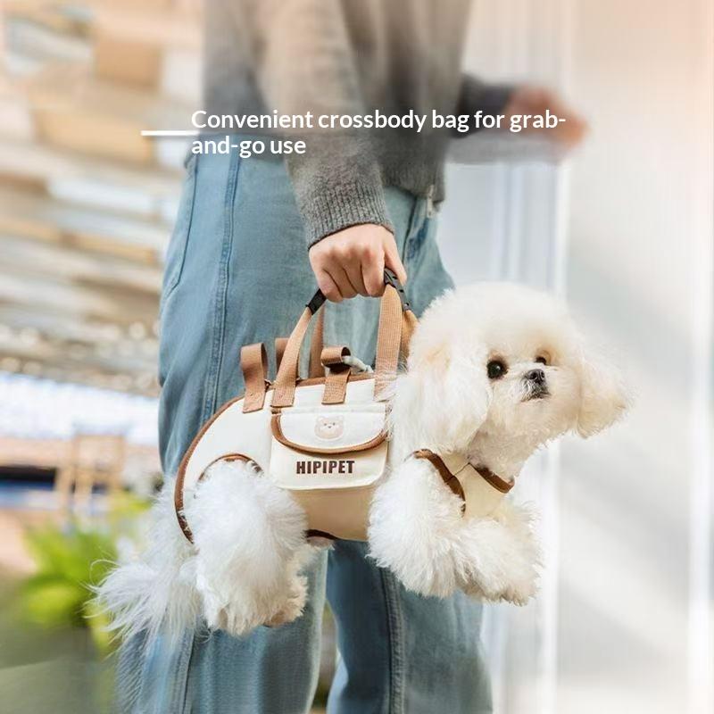 Cream-colored oxford cloth small dog carrier backpack with tan leather straps and handles by hipipet.
