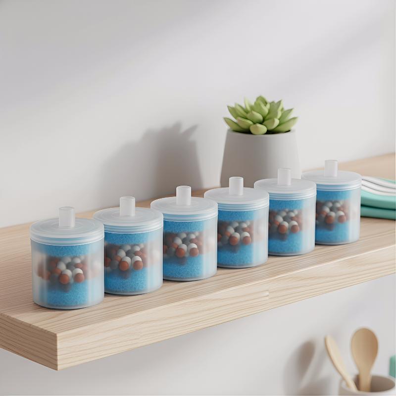 set of five translucent blue plastic cat water fountain filters replacement jars with white lids and small handles filled with colorful spherical beads for drinking water filtration