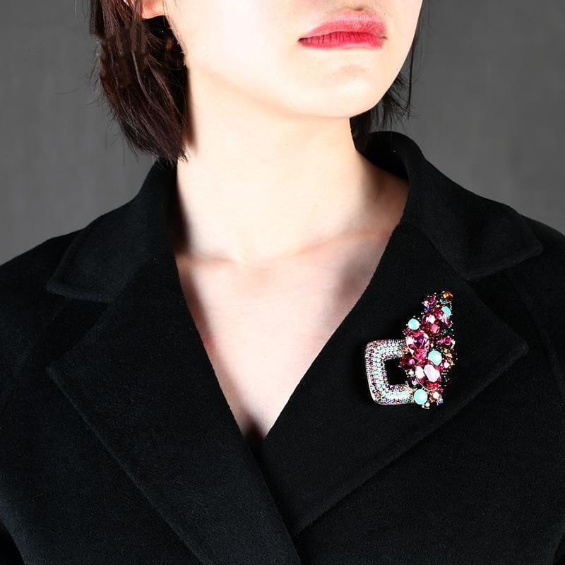 Crystal flower brooch pin for women featuring a silver-toned square base with multicolored pink purple teal and clear sparkling stones arranged in a cascading design.