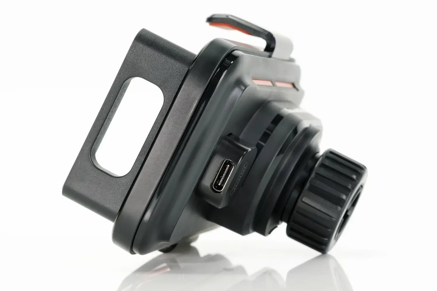 black plastic wireless car phone charger 15w mount headlamp with usb-c port and textured grip shown from the back side.