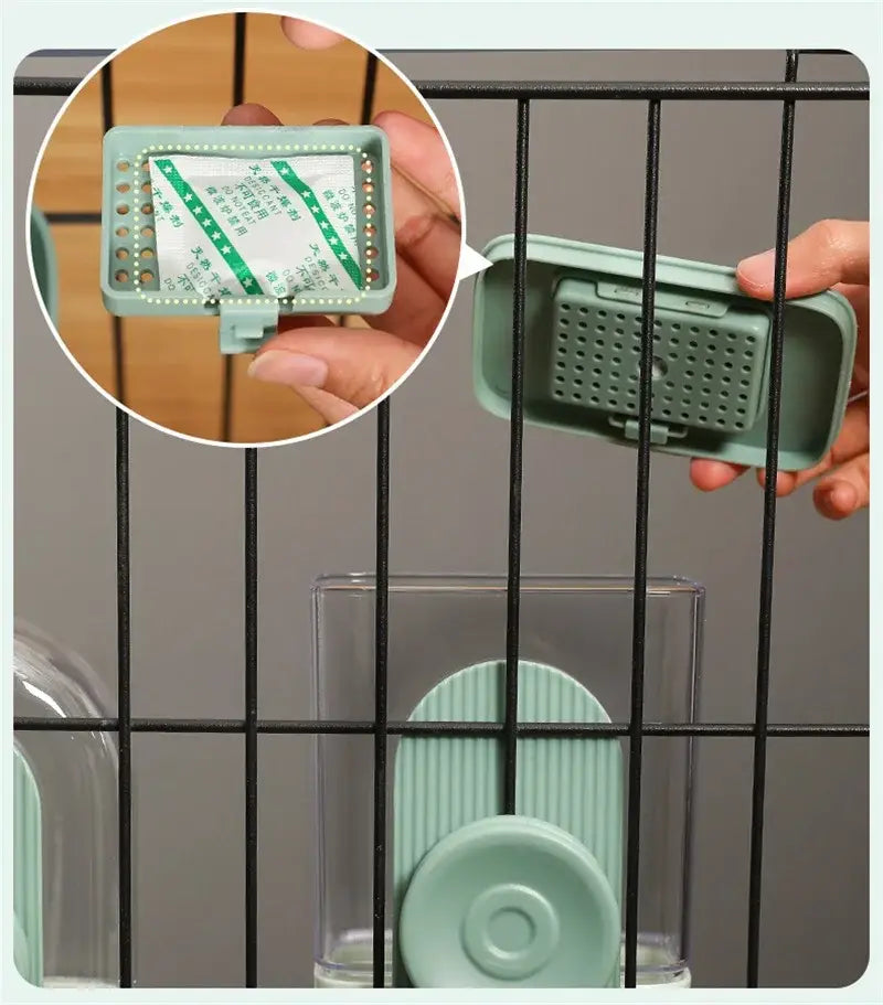 A mint green automatic pet feeder food storage container made of high-quality plastic with a perforated lid and a small clip for secure closure.
