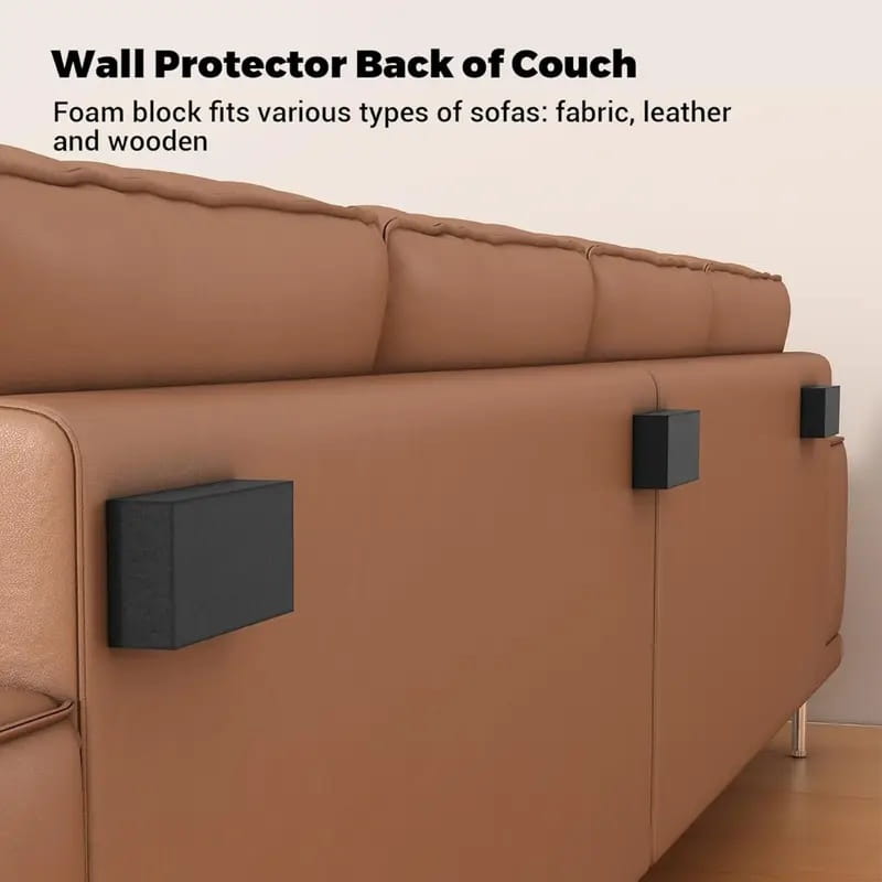 black foam wall protector blocks made of self adhesive foam material designed as furniture pads to protect couch backs from damage.