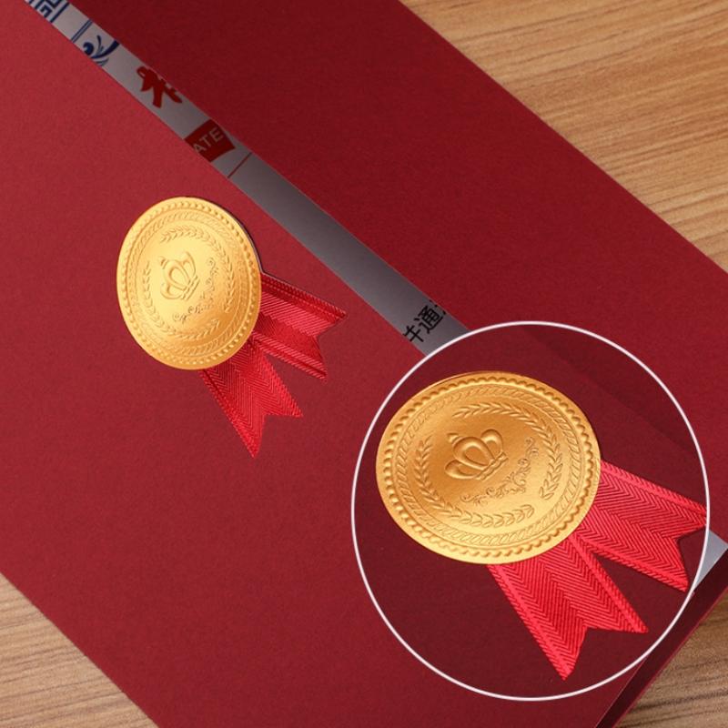 gold-colored circular seal with crown emblem and laurel wreath design attached to a vibrant red satin ribbon on an a4 certificate holder diploma document folder
