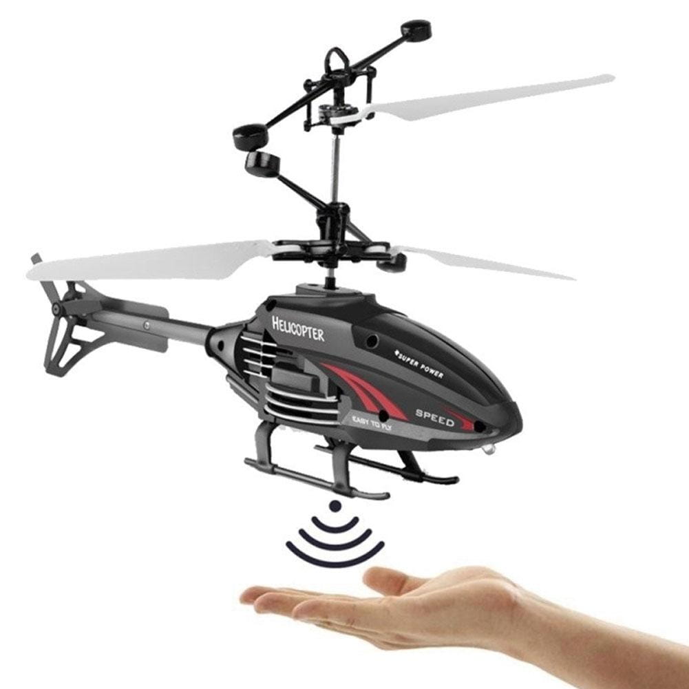 Juguete de helicóptero de inducción en suspensión teledirigido en negro y rojo, con hélices plateadas, con branding de superpotencia y velocidad en su cuerpo.