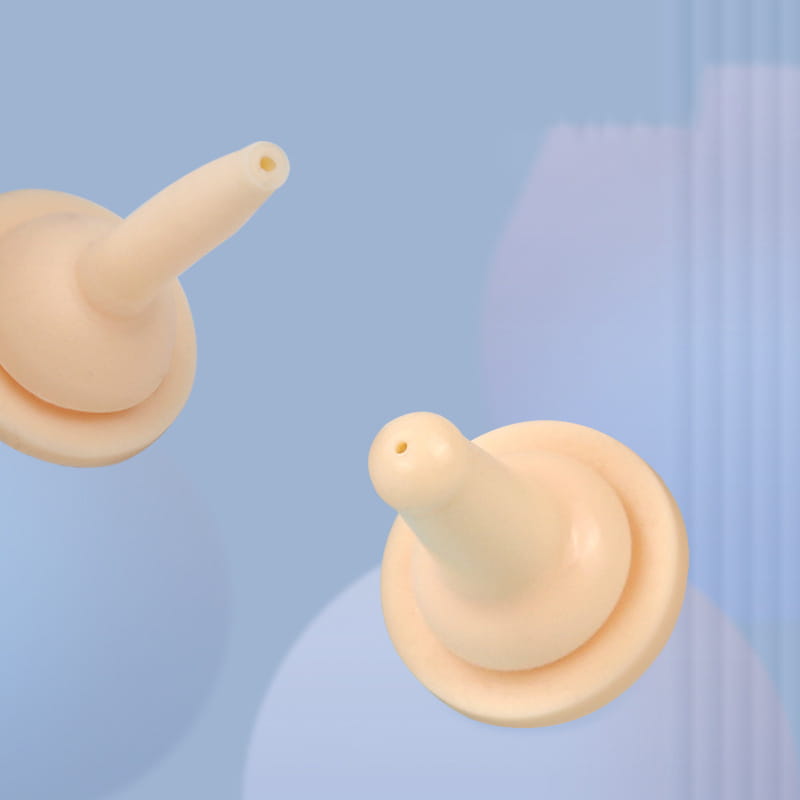 beige silicone nasal suction tips with a rounded base and tapered nozzle for pet oral syringe with silicone nipple feeder