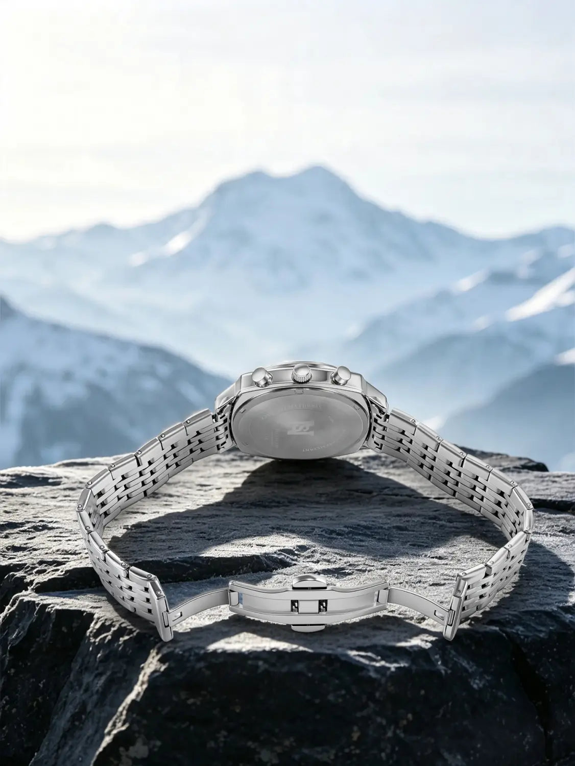 Men’s stainless steel chronograph watch with a silver-toned stainless steel case and sleek interlocking link bracelet.