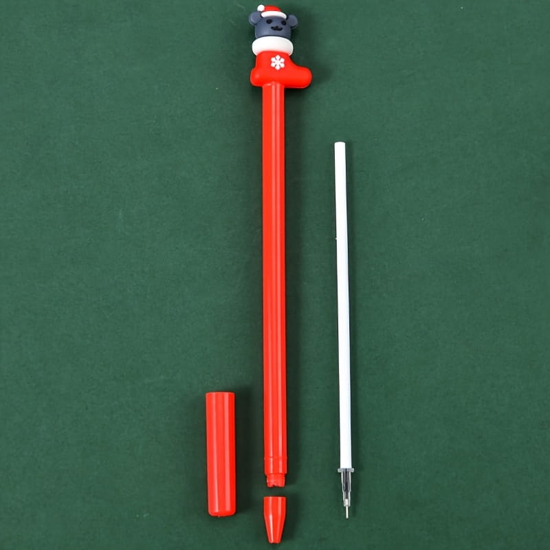 Red plastic Christmas gel pen with a festive bear-shaped top wearing a Santa hat and standing in a red boot from a 12 pack festive holiday stationery set.