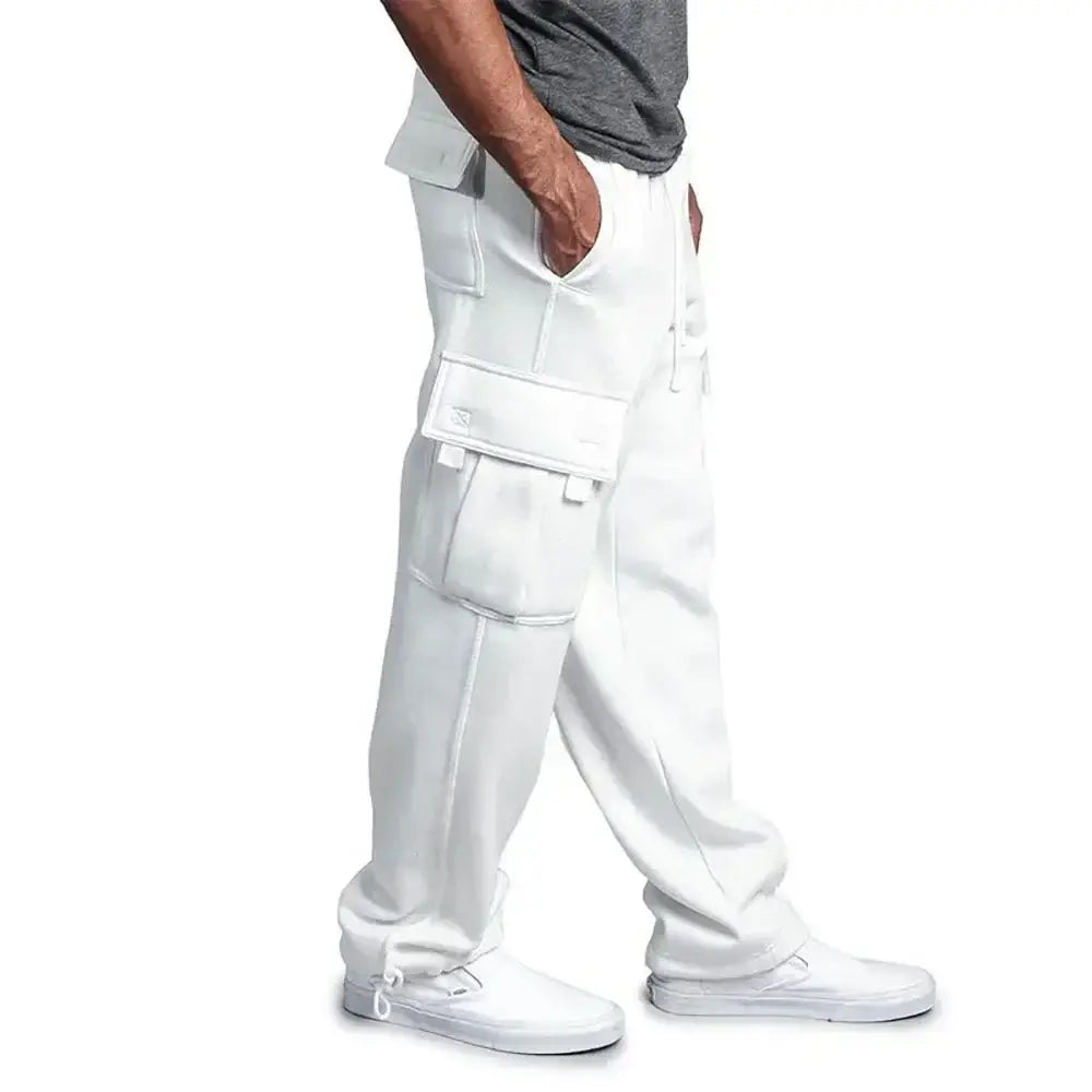 Pantalons cargo pour homme blancs à coupe ample de style jogging, avec plusieurs poches et une ceinture à cordon de serrage.