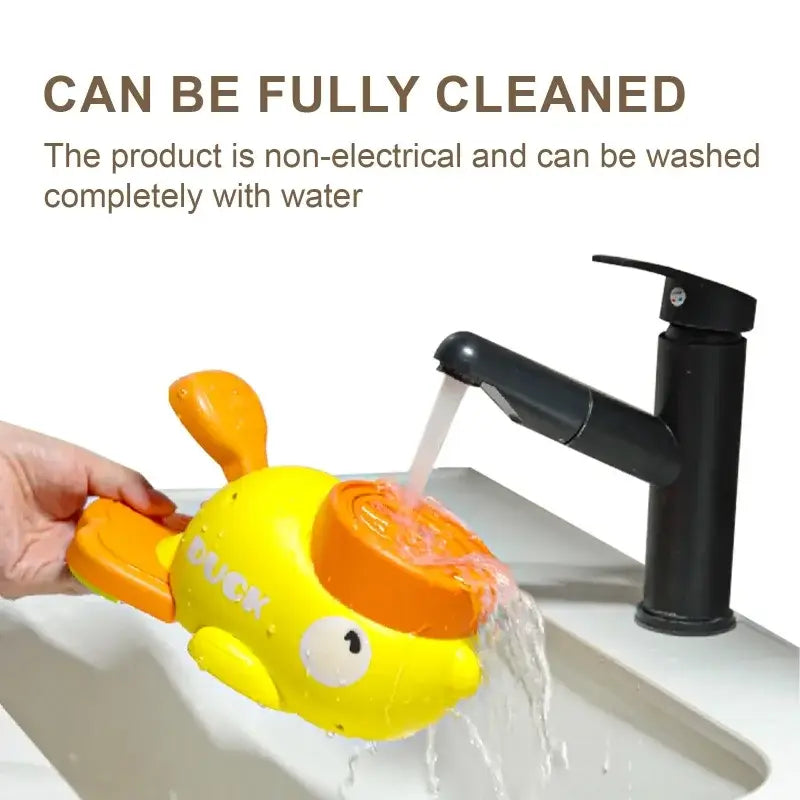Jouet en plastique canard jaune vif et orange, avec le canard imprimé sur le côté, conçu comme un distributeur automatique interactif pour animaux de compagnie de type jouets pour chat.