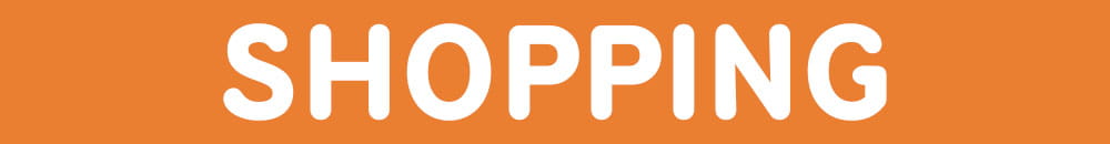 White bold sans-serif text reading shopping on a solid orange background on the Seaquest Dsv vintage graphic cotton t-shirt.