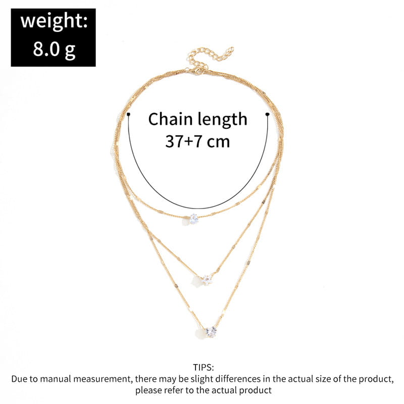Zircon layered pendant necklace for women featuring a gold-toned set of three delicate chains with sparkling crystal pendants and small bead accents.