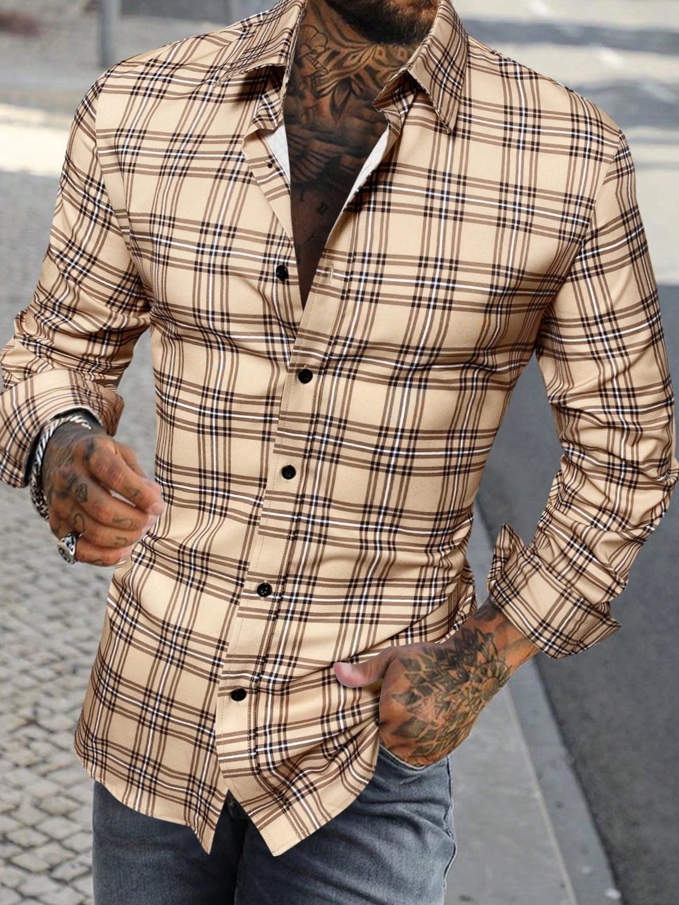 Men’s beige and black plaid long sleeve casual button up shirt with a classic collar.