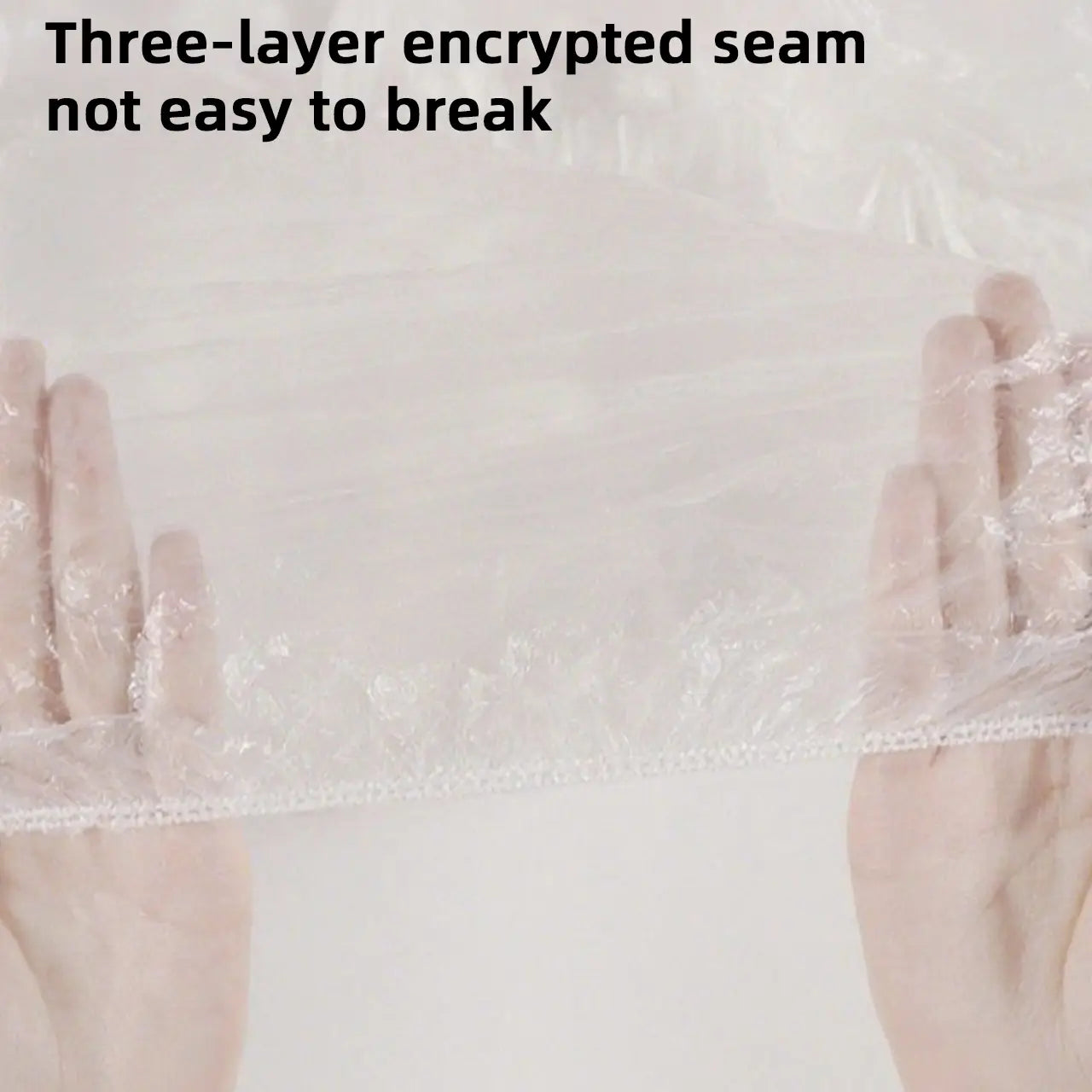 Housse de protection transparente en plastique pour meubles avec une couture renforcée à trois couches, fabriquée en plastique transparent.
