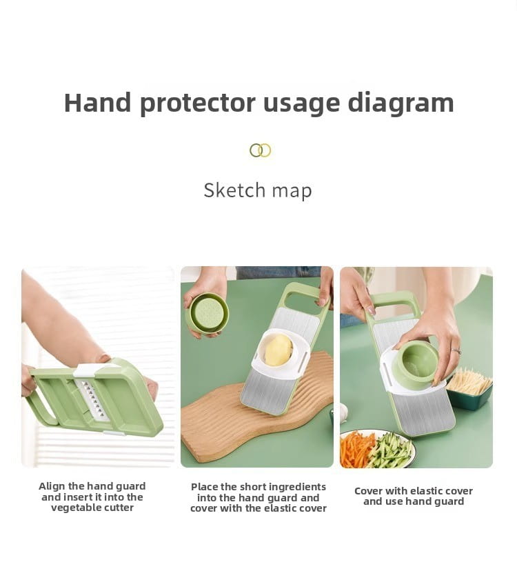 light green plastic hand guard for multi-functional stainless steel vegetable slicer shredder used for safe cutting and shredding.