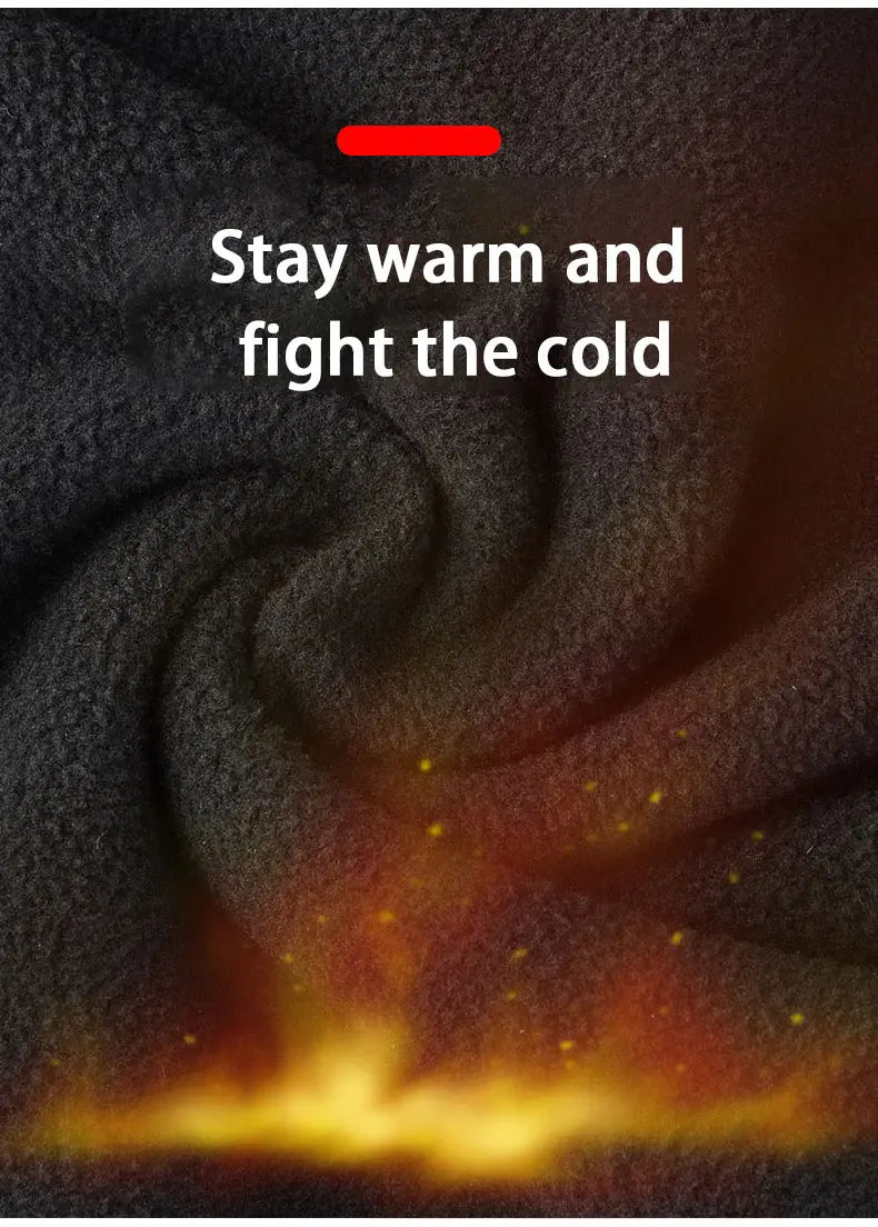 dark gray plush fleece fabric with a soft textured surface designed for warmth on the back side of touchscreen winter cycling gloves.