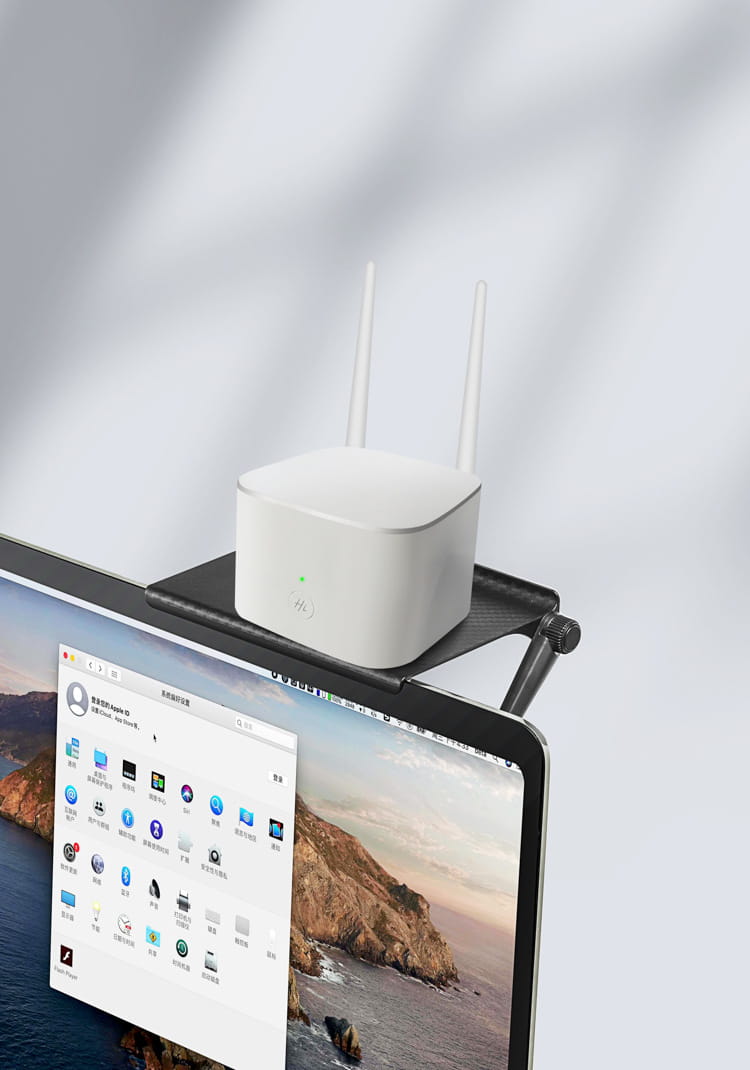 white rectangular wireless router with two antennas and green power indicator light placed on adjustable screen top storage shelf monitor stand