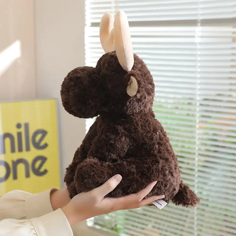 A plush stuffed animal toy 25cm featuring a brown moose with soft fluffy fur and light beige antlers.