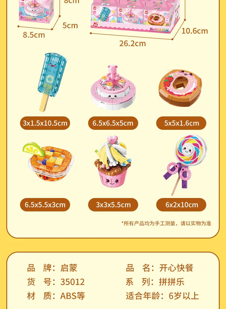にっこり顔のケーキ、ドーナツ、カップケーキ、ロリポップ、ワッフル、ポプシクルを含む、スイーツをテーマにしたピンクとホワイトのフィギュアを特徴とするファストフード・マイクロビルディングブロック玩具セット。
