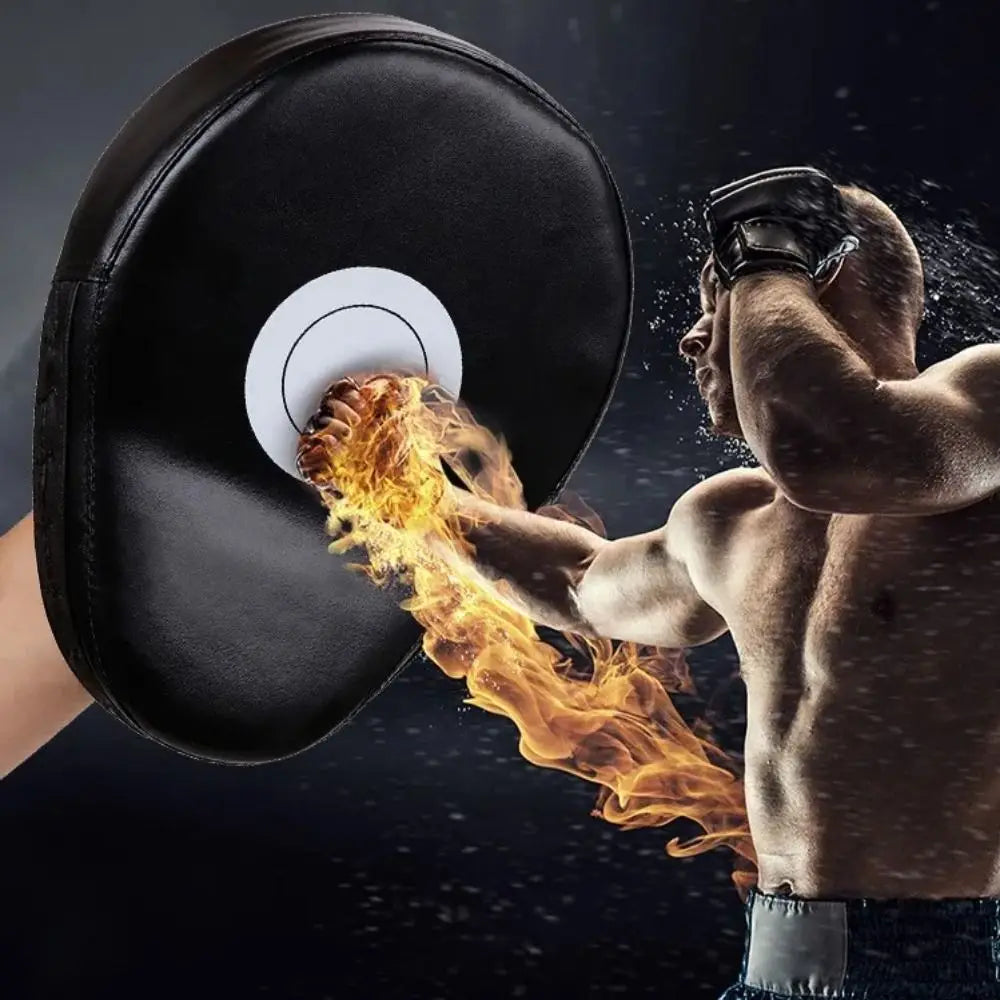 Black leather boxing punch pad focus mitt target fitness gear with a white circular target area.