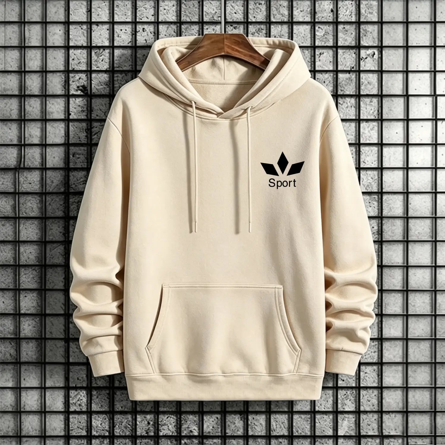 Men activewear pullover hoodie sweatshirt in cream color featuring a black adidas logo and sport text on the chest hanging from a wooden hanger.