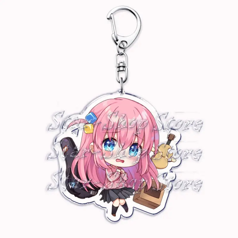 Pink-haired anime character keychain with blue eyes in chibi style made of transparent acrylic for Bocchi the Rock merchandise.