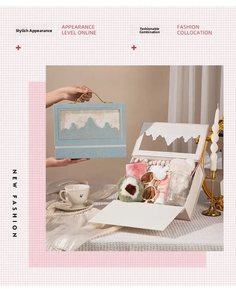 Light blue rectangular European style wedding gift box with a delicate mountain landscape design and a gold-colored handle for candy packaging.