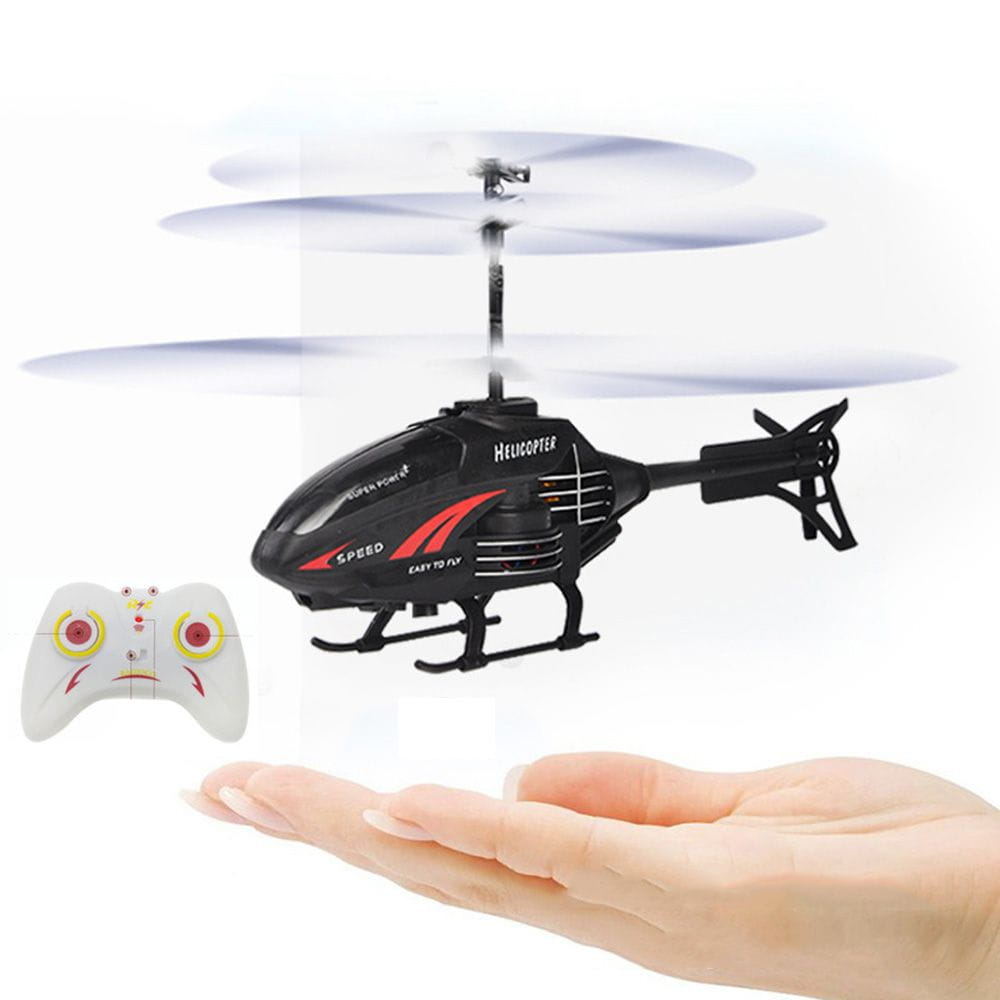 A black and red flying helicopter toy with super power branding hovering above an outstretched hand, featuring USB rechargeable capability.