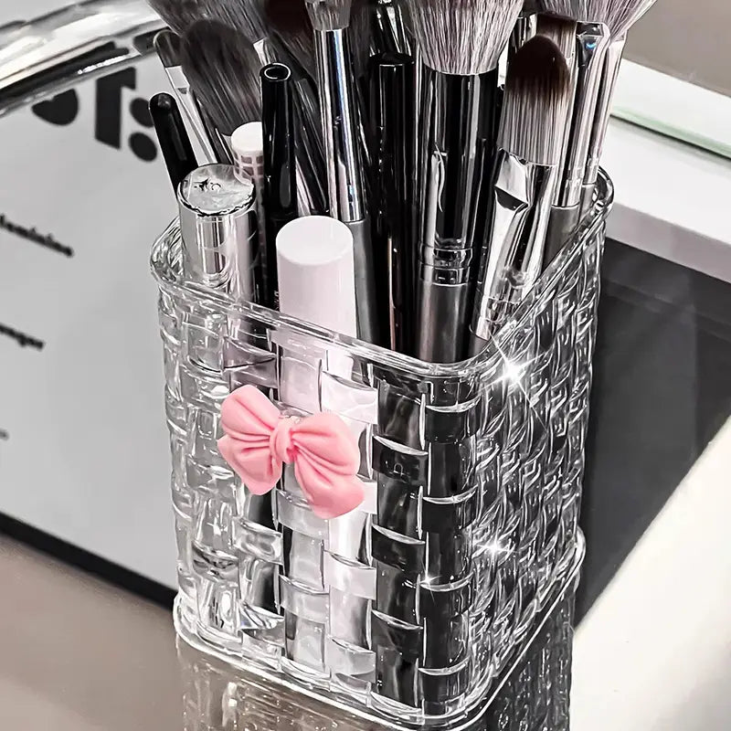 clear woven-patterned acrylic bow pen holder desktop storage organizer with pink bow designed for makeup brush or pen storage