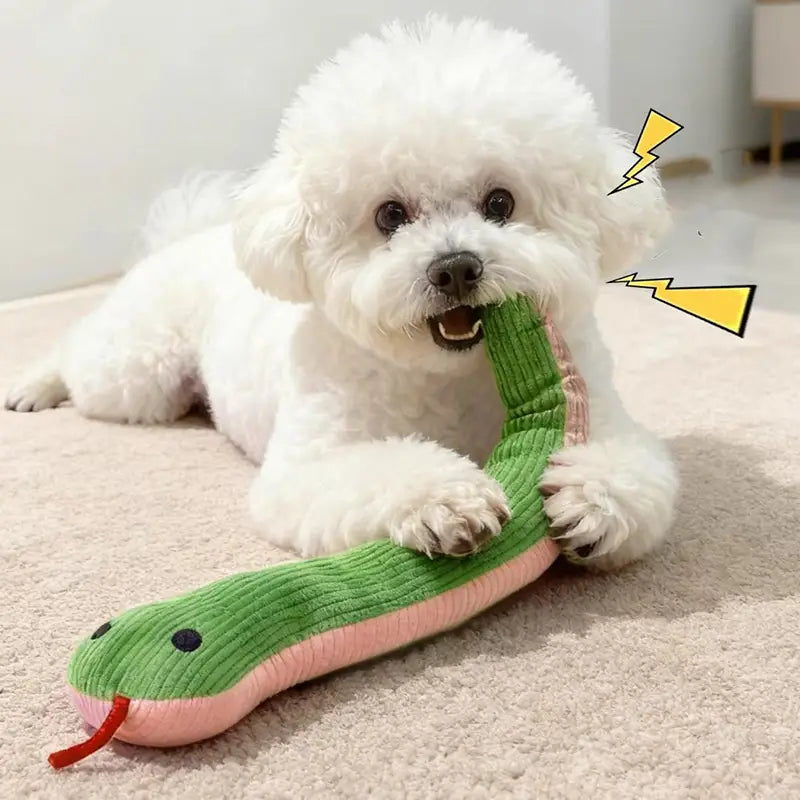 赤い舌を備えた緑とピンクのコーデュロイのヘビの犬おもちゃのぬいぐるみ。おもちゃのカテゴリーにおける耐久性のあるペット玩具として設計されています。
