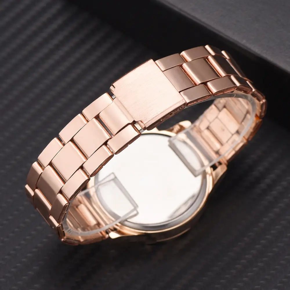 Rose gold women luxury quartz business wristwatch with a rose gold-toned stainless steel band featuring a sleek interlocking link design.