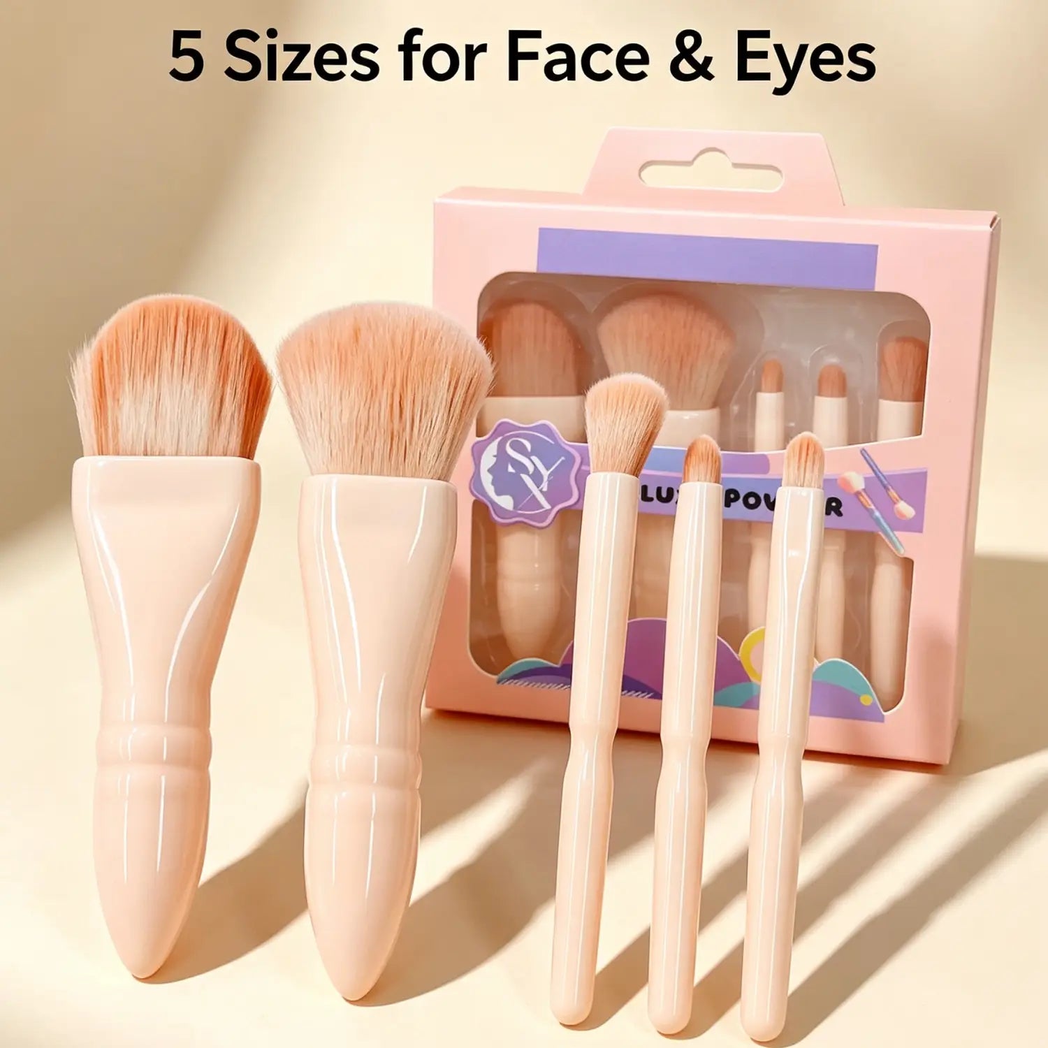Ensemble complet de 5 pinceaux de maquillage couleur rose pastel, avec des manches coniques doux et des poils duveteux couleur pêche, fabriqués sur le territoire continental de Chine pour une application professionnelle du maquillage.
