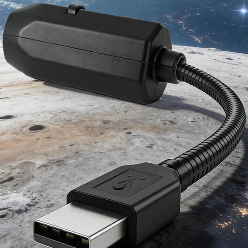 adaptateur noir USB-C vers micro-USB avec câble ondulé flexible et boîtier en plastique mat pour la connexion de la lampe de projection veilleuse