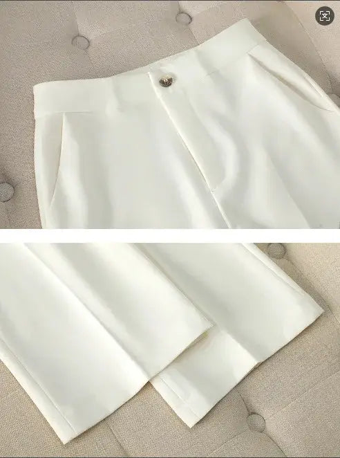 Pantalon blanc taille haute, coupe sur mesure et plis avant discrets, de l’ensemble de tailleur d’affaires pour femme cadre rose