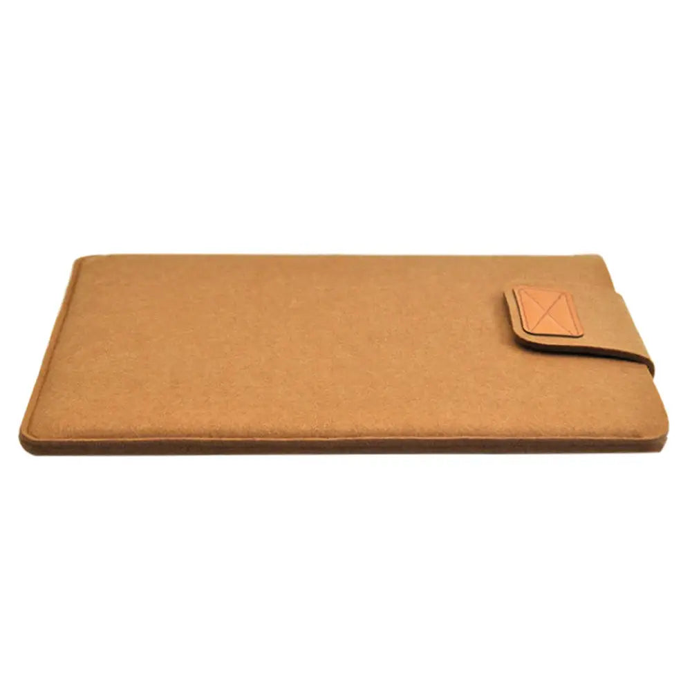 tan felt laptop bag sleeve for macbook air with matching leather flap and stitched edges designed as a protective tablet bag