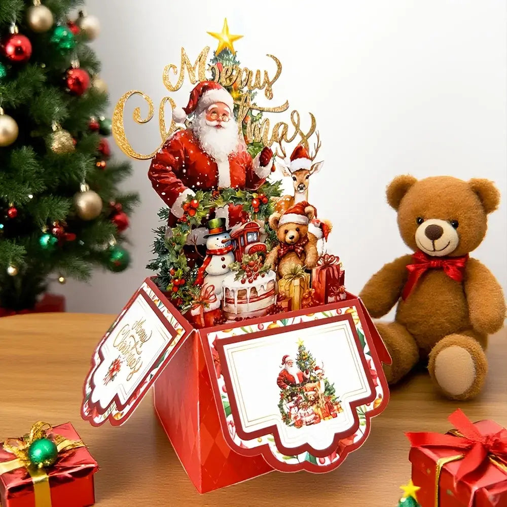 赤のクリスマスをテーマにした3Dの飛び出す（ポップアップ）グリーティングカードで、トナカイ、雪だるま、プレゼントなどの華やかな要素に囲まれた、詳細なサンタクロースの像を特徴としています。