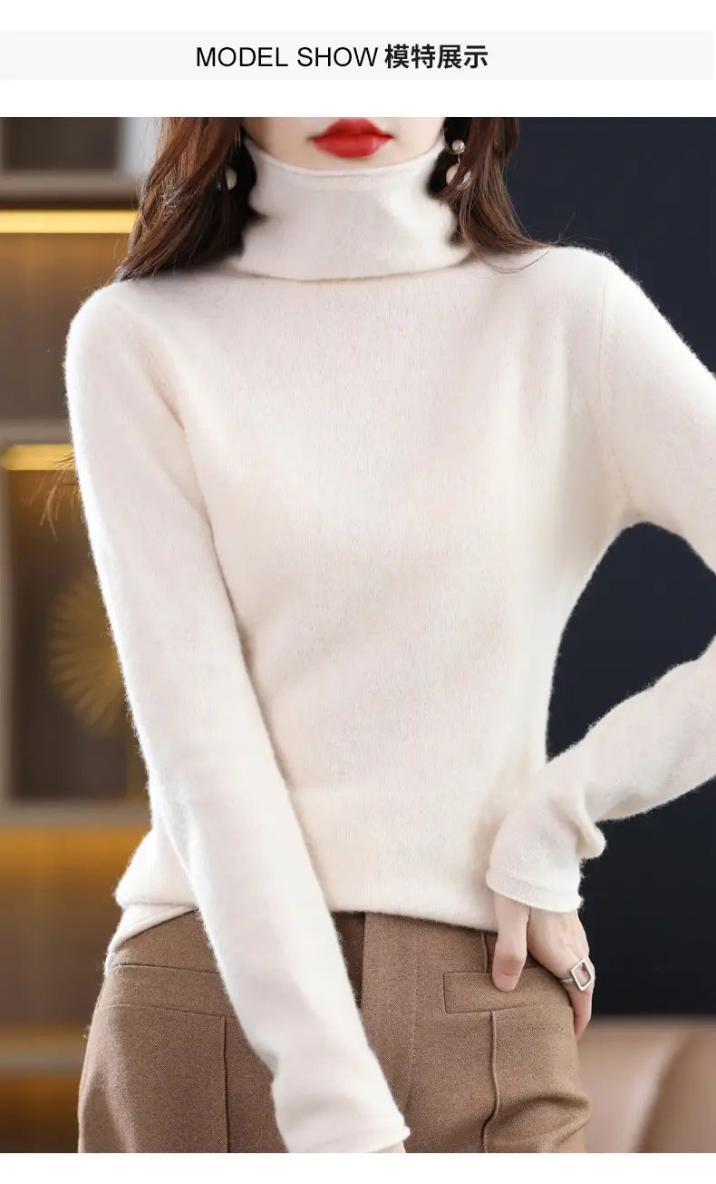 Cream-colored merino wool turtleneck sweater for women with long sleeves and soft ribbed knit texture.