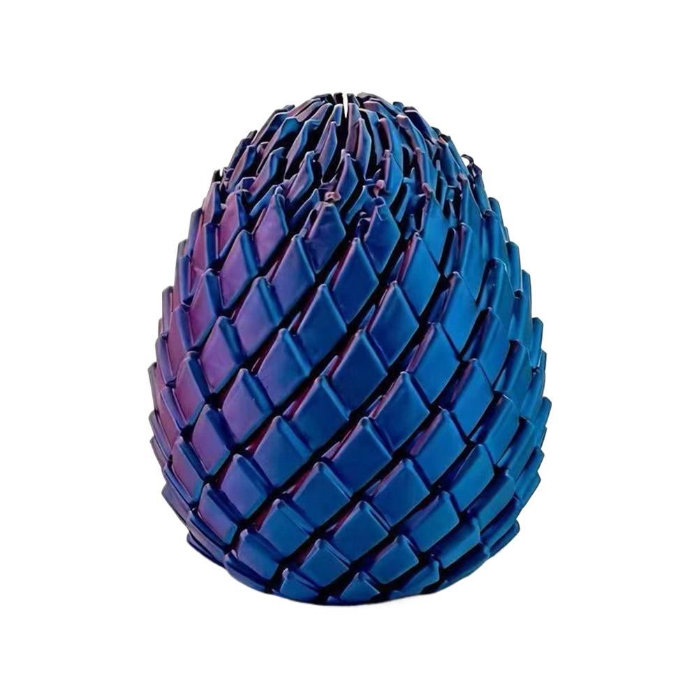 A glossy iridescent blue and purple articulated dragon egg fidget toy with a textured scale-like surface shown from the front.