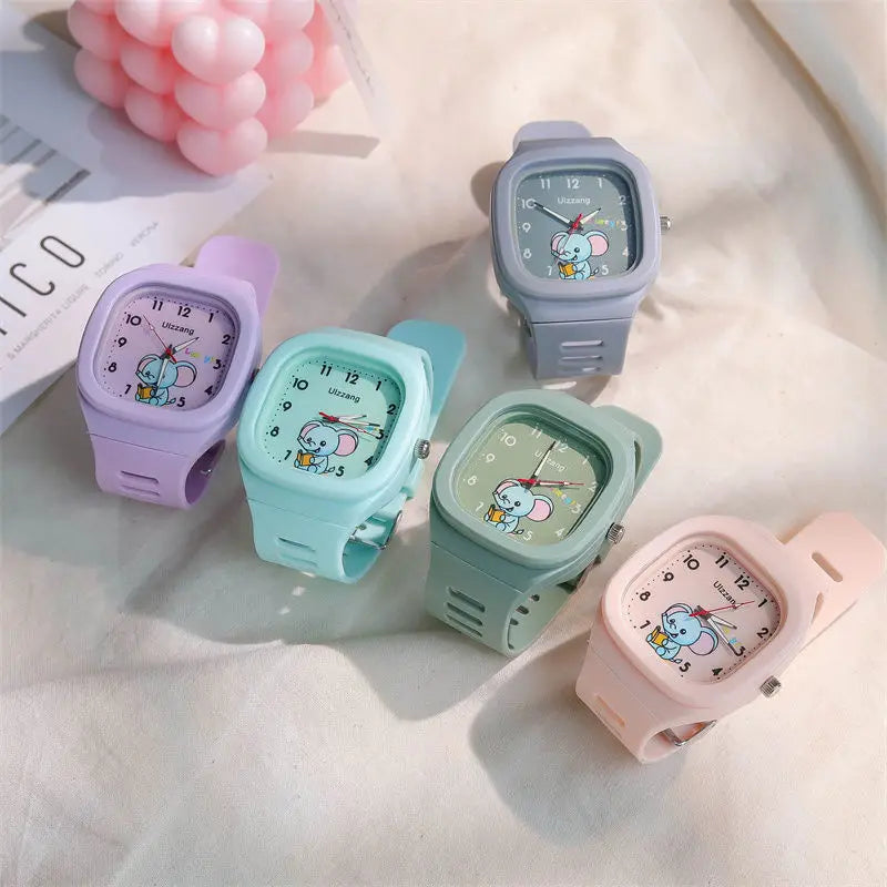 Pastel-colored silicone-wrapped kids luminous cartoon elephant digital watches with white square faces designed for children.