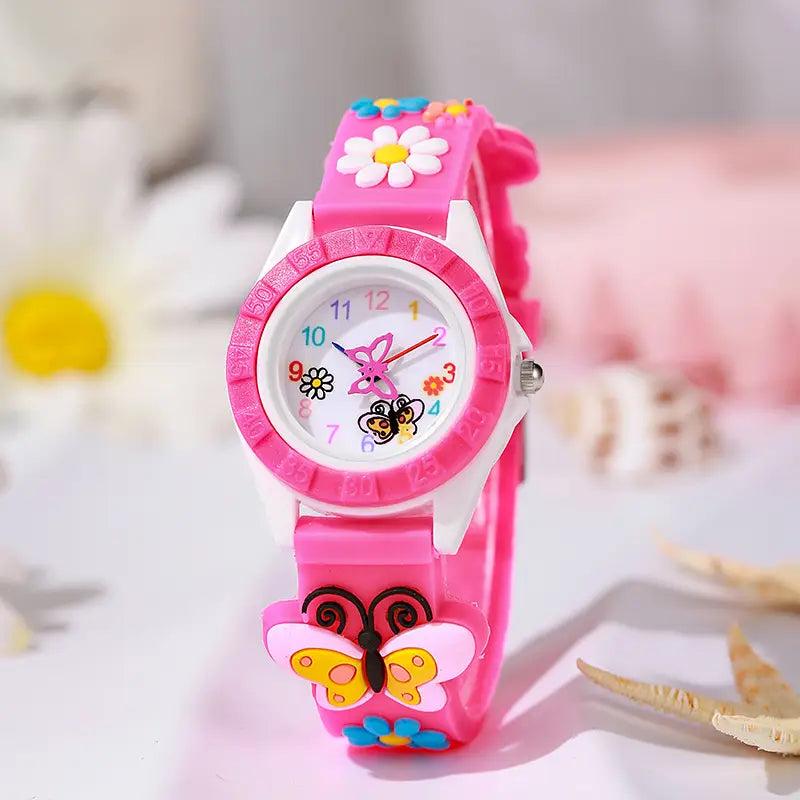 Girls butterfly silicone quartz watch featuring a pink silicone band with a white face decorated with colorful butterfly and flower designs.