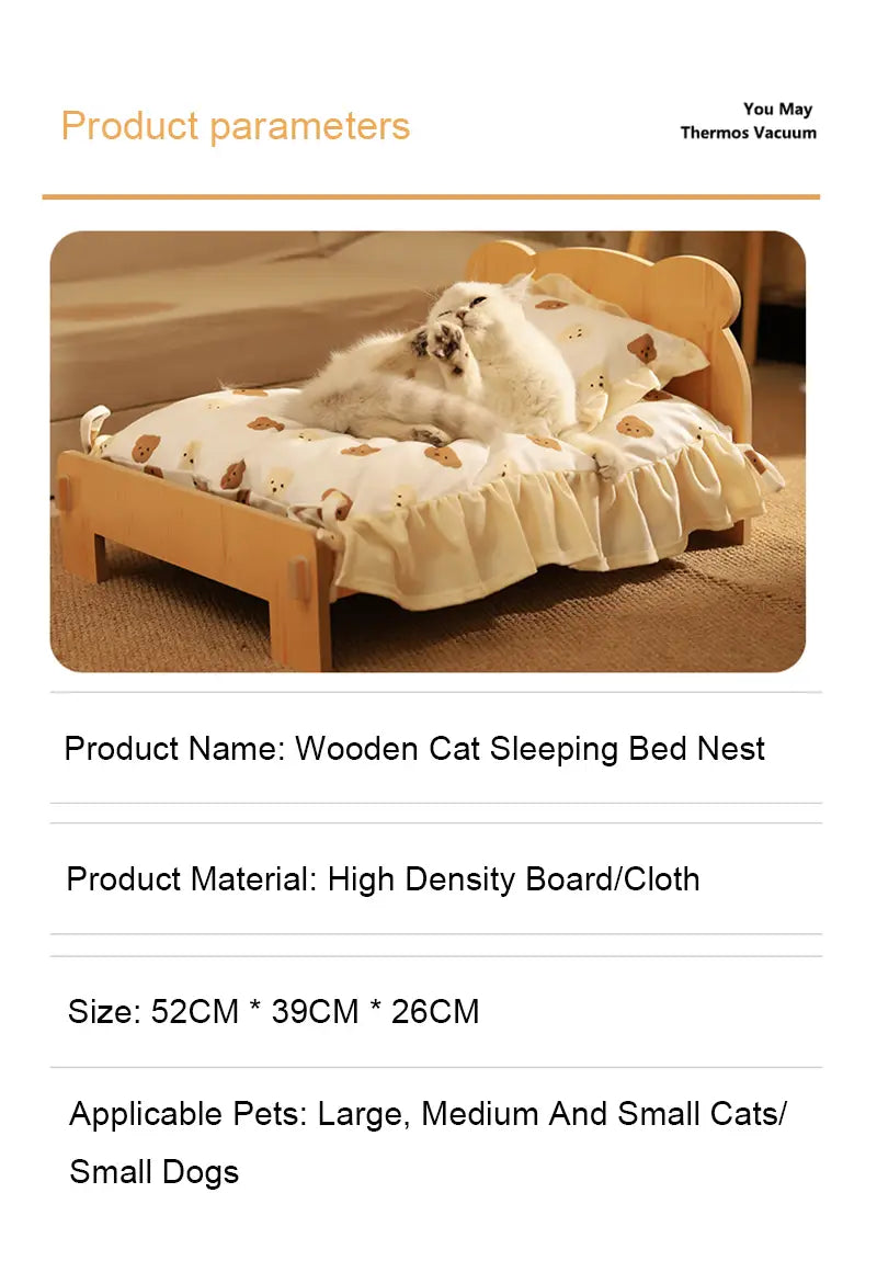 A cozy wooden cat bed with a light wood frame and soft cream-colored ruffled cloth bedding featuring small brown bear prints.