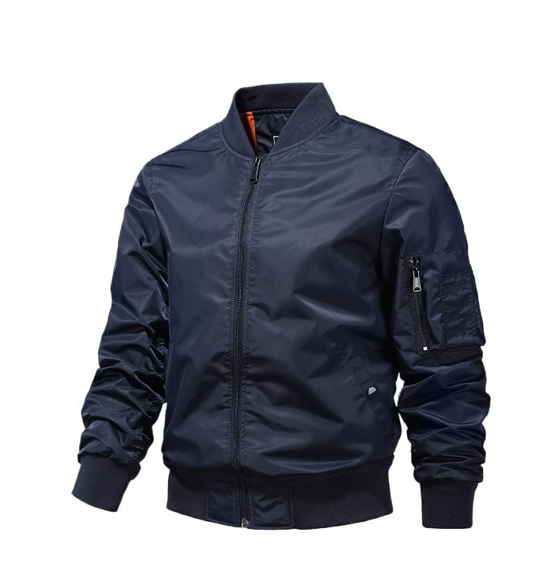 Veste bomber pour homme en bleu marine avec finition mate et doublure orange discrète au col, conçue pour une tenue d’extérieur de printemps décontractée.