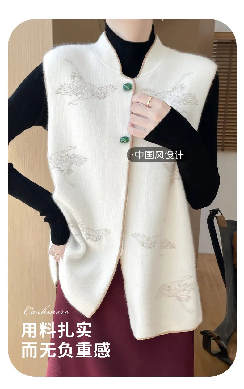Cream-colored wool embroidered vest for women featuring plush knit fabric with delicate bird motifs and jade-green button accents.