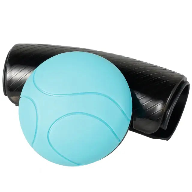 Light blue silicone steering wheel spinner knob with a textured rounded surface and subtle curved lines for 360 degree turn assist.